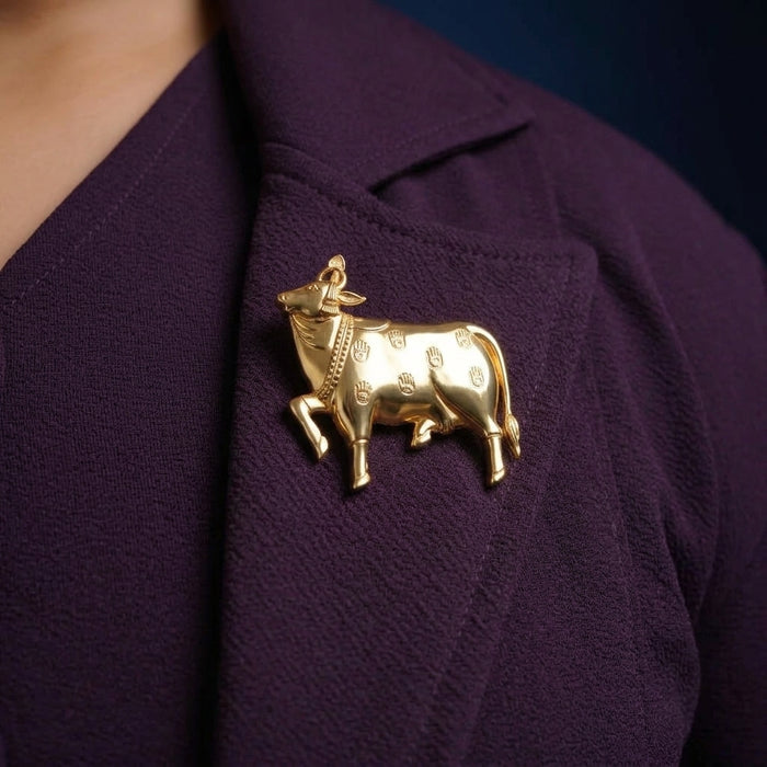 925 silver pichwai cow gold plated brooch on a purple jacket