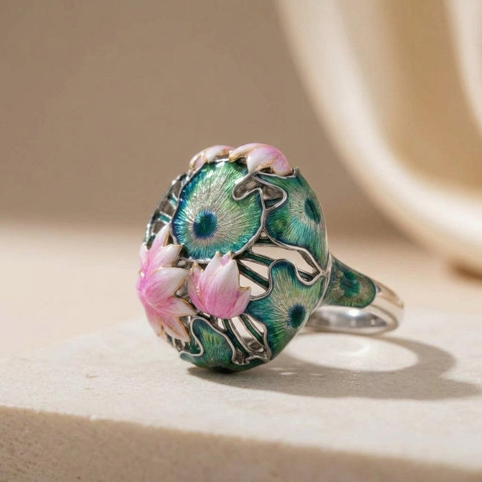 925 silver Pichwai lotus enamel ring with floral design on a beige surface
