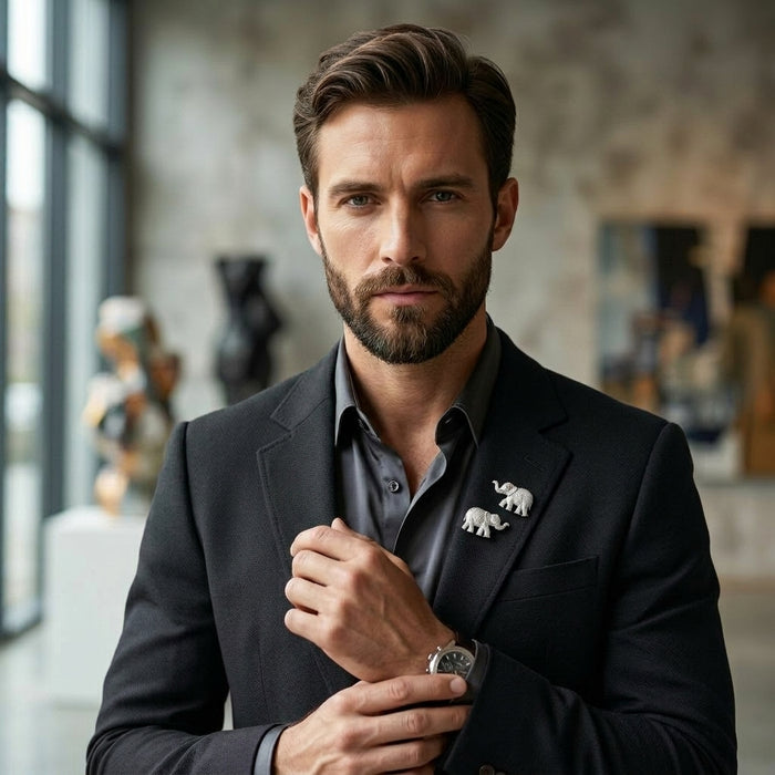 Man in a suit with an moissanite diamond 925 silver elephant lapel pin brooch in a stylish interior setting