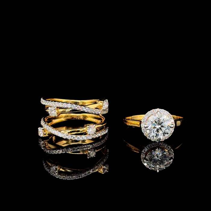 Round halo engagement ring and contoured wedding band, shown as a set