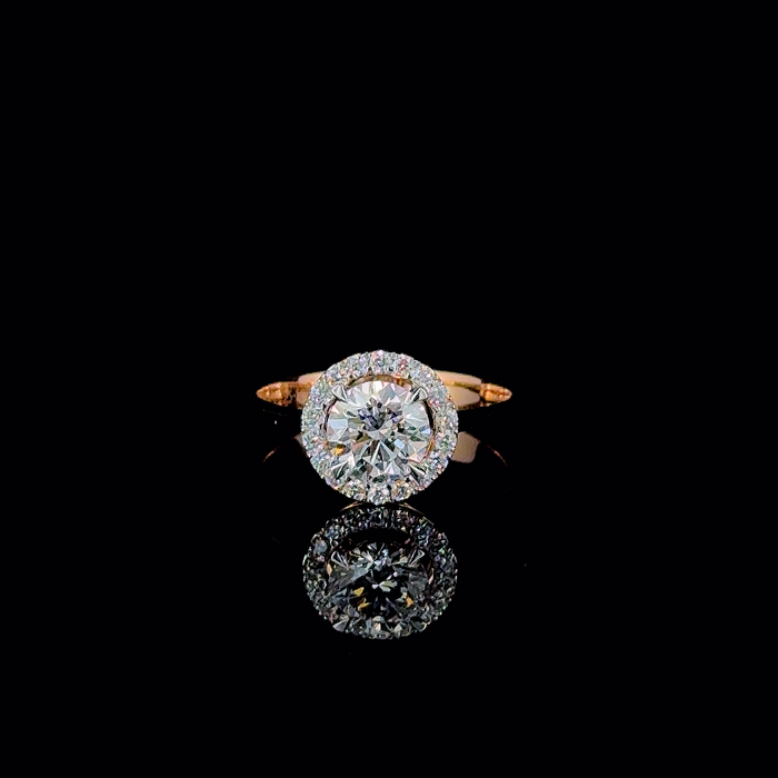 Round halo plain shank ring, front-facing view of stone